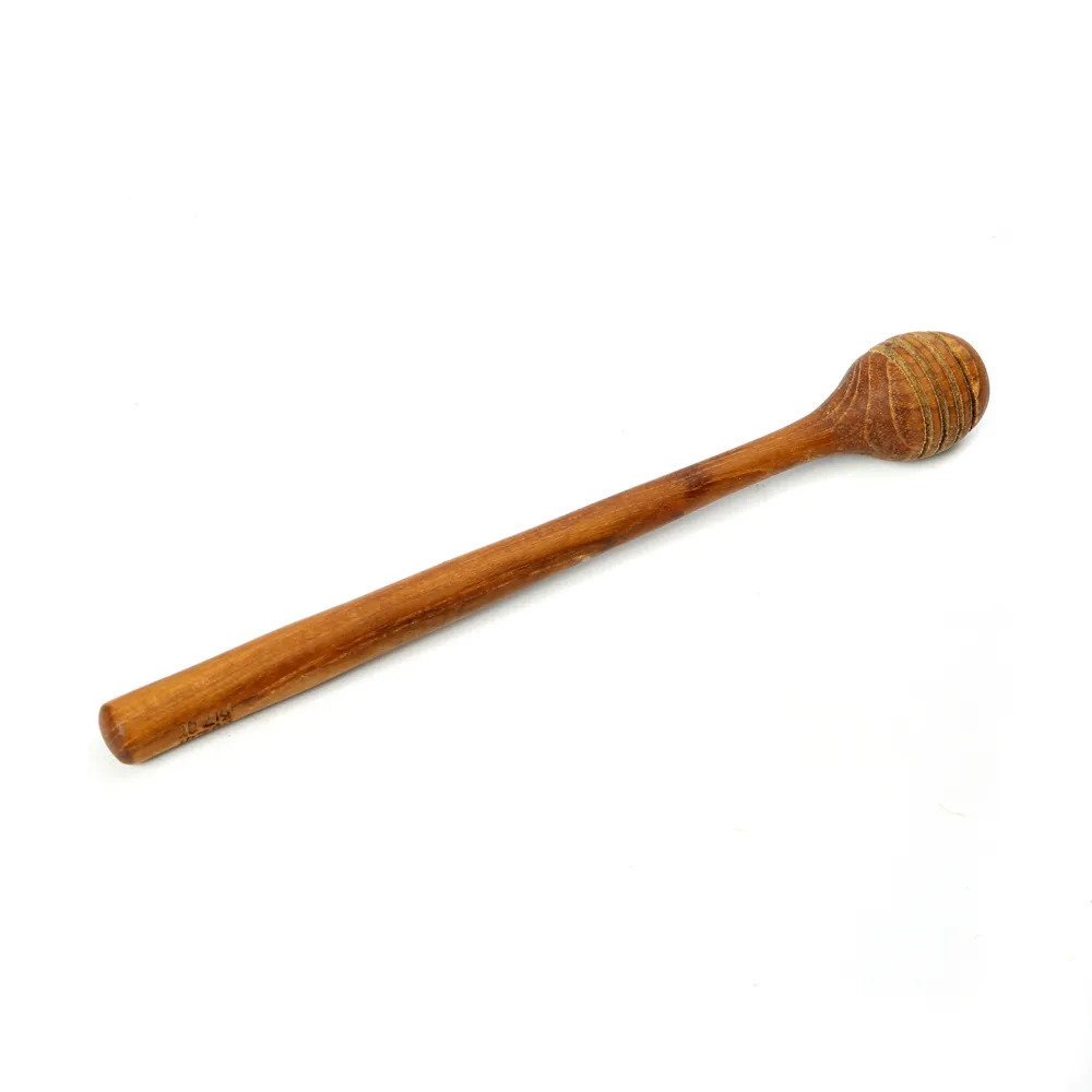 Le rouleau de miel de racine de teck