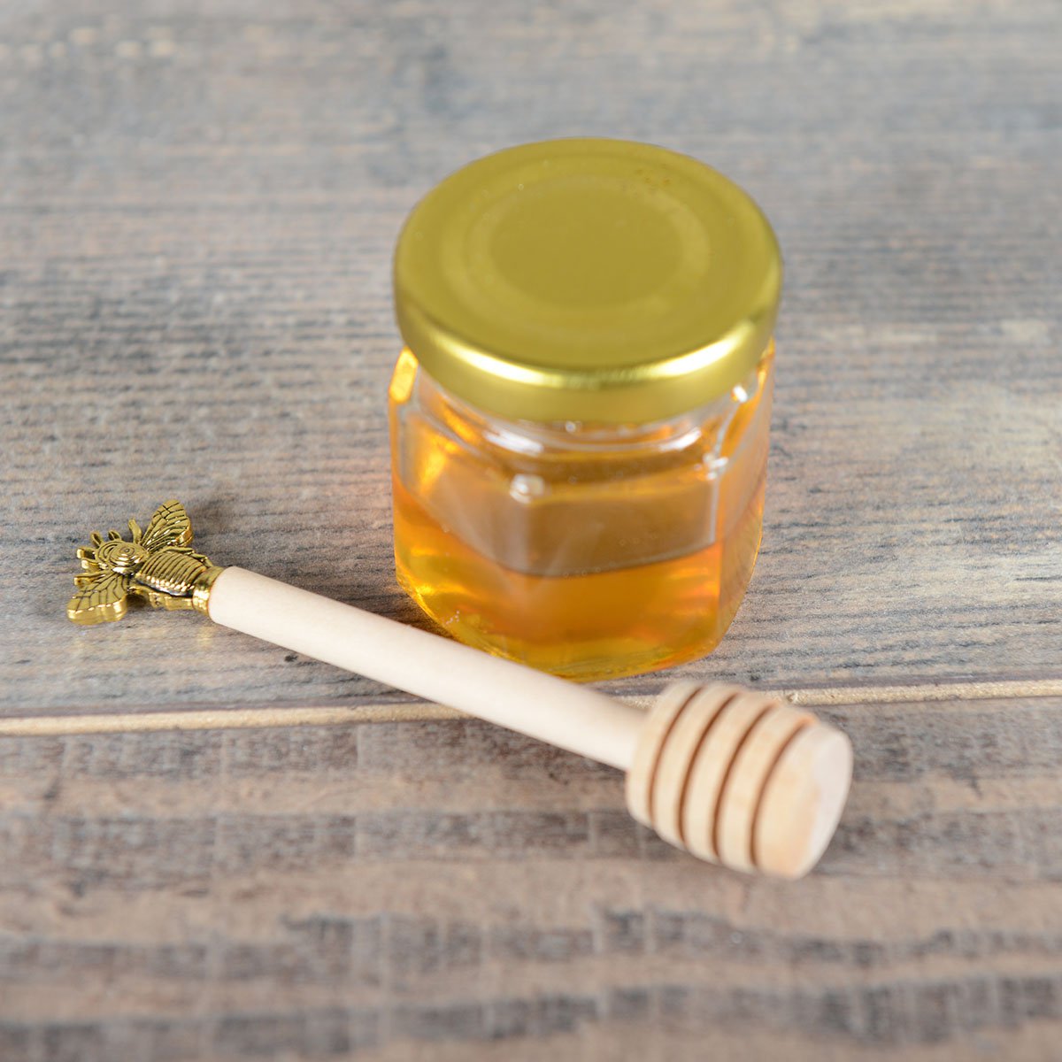 Cuillère à miel dorée abeille