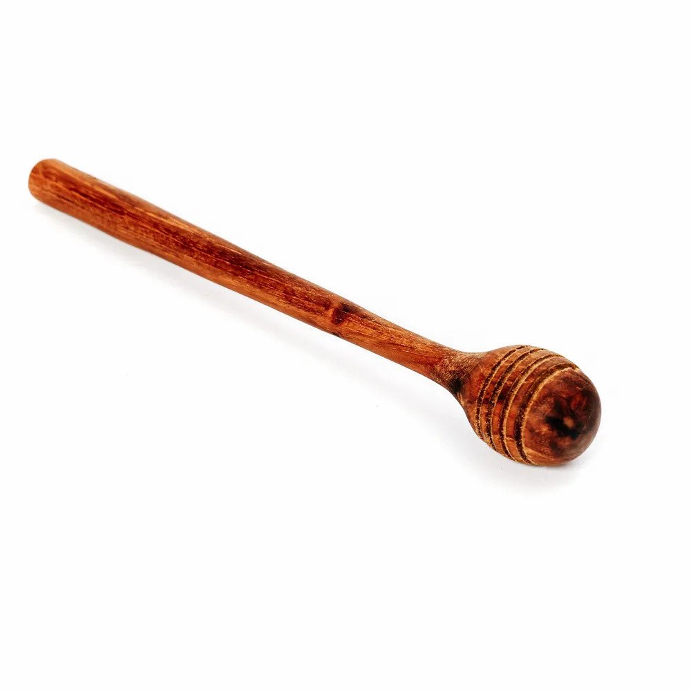 Le rouleau de miel de racine de teck